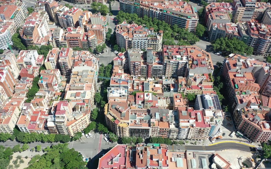 Aerial Stock Footage: Flying with Drone over Eixample Expansion District Barcelona in Spain