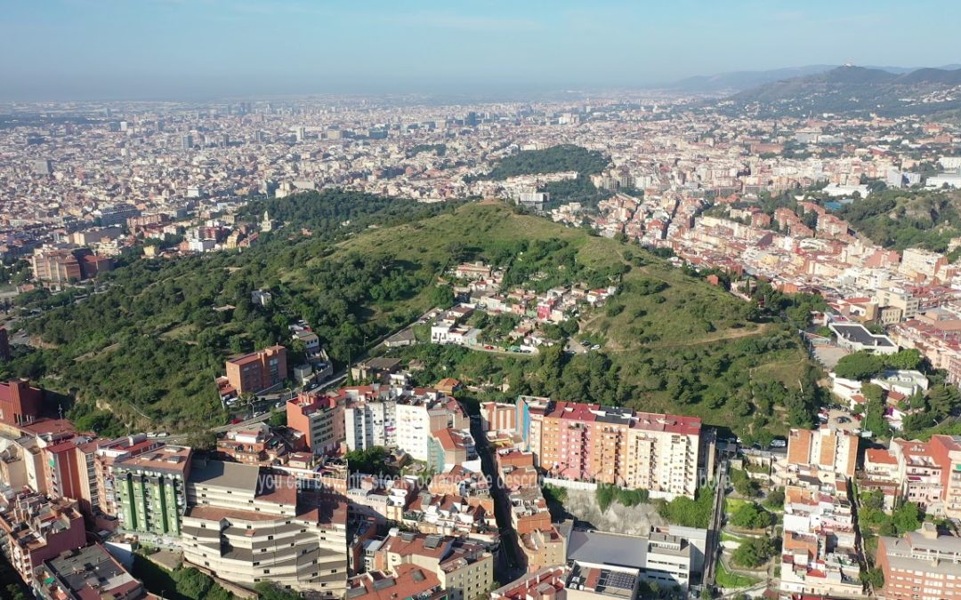 Aerial Stock Footage: Flying with Drone over City Barcelona in Spain | urban houses and streets | 4k